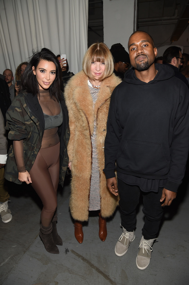 Kim Kardashian, Anna Wintour, and Kanye West pose backstage at the adidas Originals x Kanye West YEEZY SEASON 1 fashion show during New York Fashion Week Fall 2015 at Skylight Clarkson Sq on February 12, 2015 in New York City
